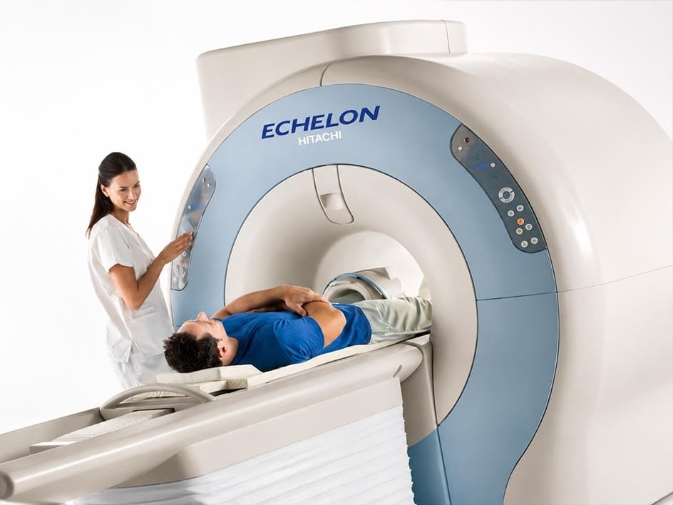 Patient undergoing an MRI scan with a technologist at Manhattan MRI in Midtown Manhattan.