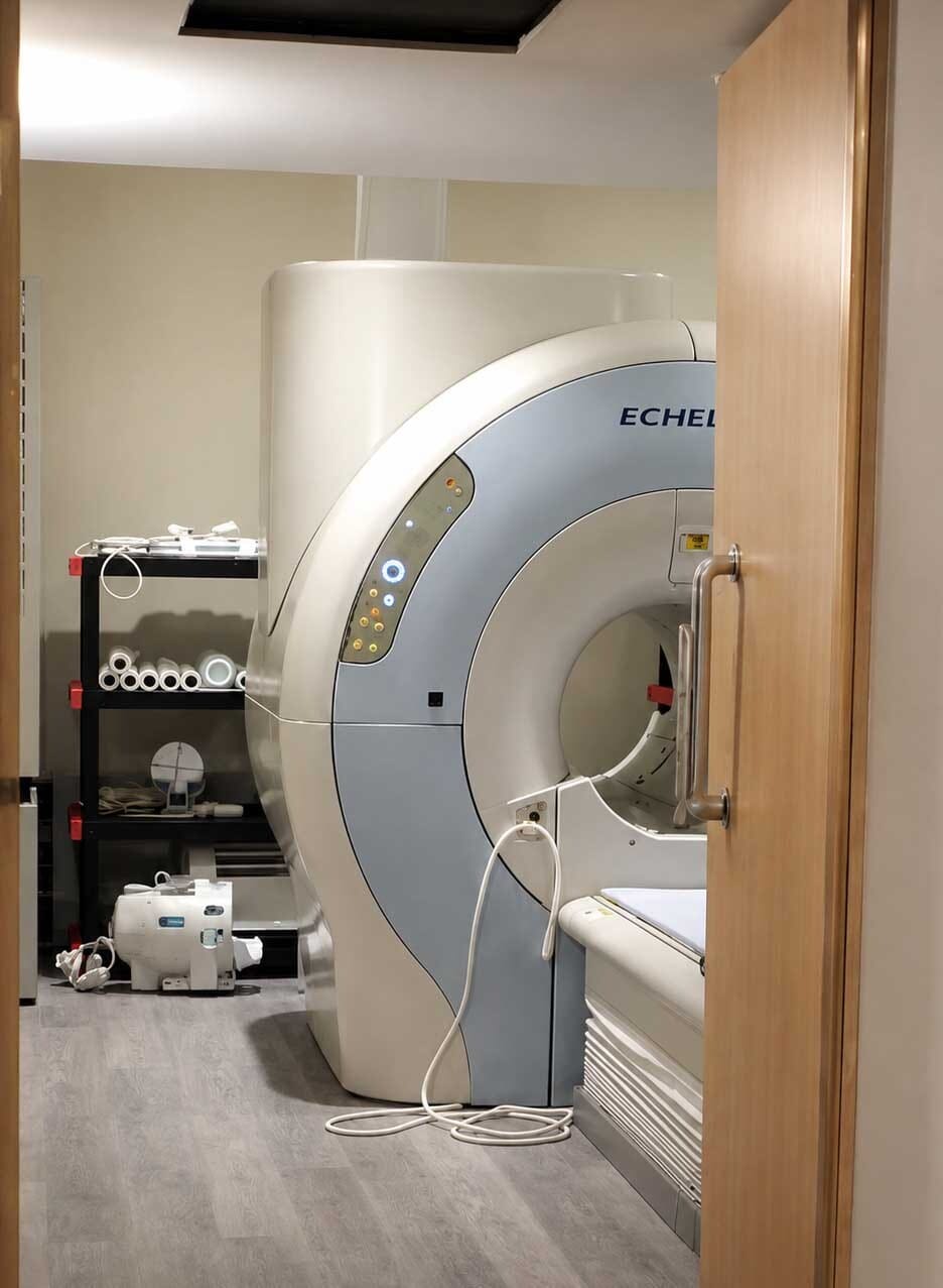 MRI scanner room at Manhattan MRI in Midtown Manhattan showing the imaging equipment and examination table.